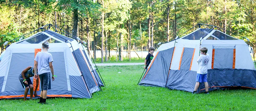 Wrangler Campout with Camp Widjiwagan, boys in tents
