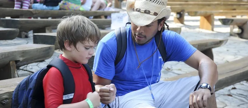 Camper and counselor at camp