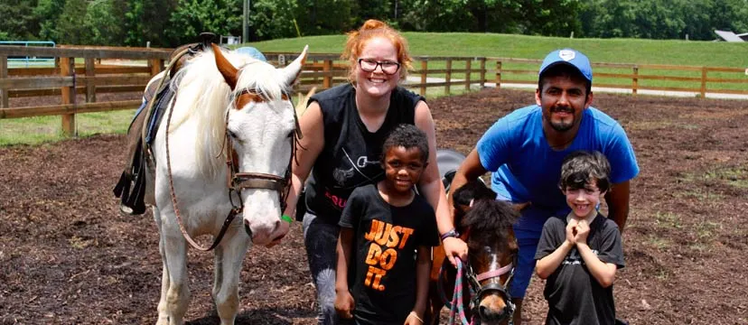 Kids with horse and pony