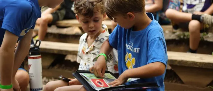 campers with their pokemon cards