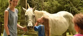 kid with unicorn