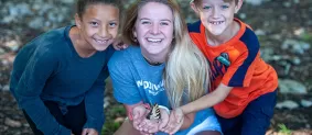 Kids holding a butterfly