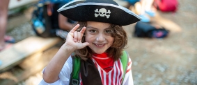 Girl dressed in pirate costume