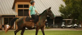 Girl riding horse